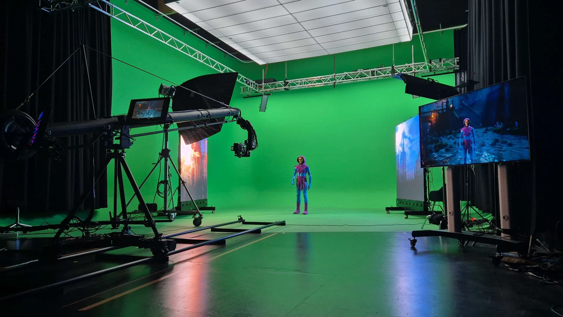 Green screen studio with a Skeletor character and camera tracking equipment